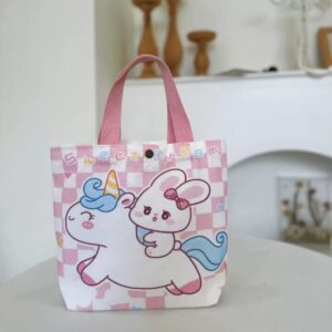 Pink checkered canvas tote bag with unicorn and bunny graphic, "Sweet Dream" text, for kids' daily use.