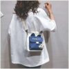Blue & white canvas drawstring shoulder bag with bunny ears, "Chong ya!" text, and plush rabbit charm for casual wear.
