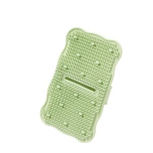 Light green silicone foot scrubber mat with suction cups and massage bristles for shower use.