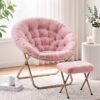 Pink faux fur moon saucer chair and matching ottoman with gold metal folding frames for bedroom or living room.
